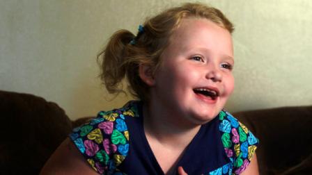 In this photo taken Monday, Sept. 10, 2012, seven-year-old beauty pageant regular and reality show star Alana Honey Boo Boo Thompson gestures during an interview in her home in McIntyre, Ga. The reality show Here Comes Honey Boo Boo has been a ratings winner in recent weeks, capitalizing on redneck stereotypes and the oversized personality of Thompson. (AP Photo/John Bazemore)