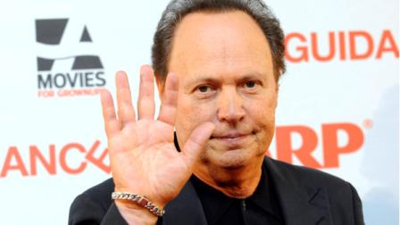 Actor Billy Crystal arrives on the red carpet for a screening of his latest film, Parental Guidance, at the AARPs national convention in New Orleans, Fri., Sept. 21, 2012. The film, starring Crystal, Bette Midler and Marisa Tomei, opens in theaters later this year. (AP Photo/Cheryl Gerber)