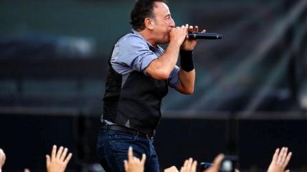 FILE - In this Aug. 14, 2012 file photo, Bruce Springsteen performs at Fenway Park in Boston. Springsteen celebrated his 63rd birthday onstage until nearly 2 a.m. Sunday, Sept. 23, 2012, joined at the end by his hearty mom, at MetLife Stadium in East Rutherford, N.J. Adele Springsteen danced and sang background to Twist and Shout, walking offstage with her son and his band at nearly 2. Her only concession to age was a pair of hastily made earplugs. (AP Photo/Michael Dwyer, File)