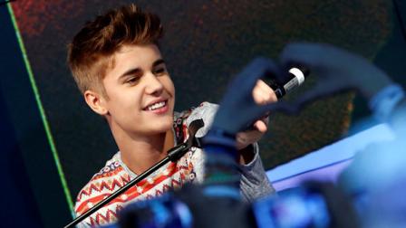FILE: Canadian singer, Justin Bieber, performs at an exclusive acoustic concert in Frankfurt, central Germany, Tuesday, Sept. 11, 2012. (AP Photo/dapd/ Mario Vedder)
