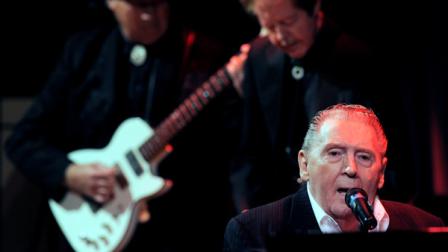 Jerry Lee Lewis, right, performs with his band during An Evening with Jerry Lee Lewis at The GRAMMY museum in Los Angeles, Tuesday, Sept. 28, 2010. Lewis turns 75 on Wednesday. (AP Photo/Chris Pizzello)