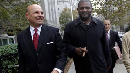 Former New York Giants linebacker Lawrence Taylor, right, leaves federal court with his attorney Arthur Aidala, Friday, Oct. 26, 2012, in New York. Taylor won a lawsuit that tried to hold him accountable for having sex with a 16-year-old girl in a New York-area hotel room. The NFL Hall of Famer acknowledged that he had sex in 2010 with a prostitute. He denied, however, that he ignored obvious signs she was a teen runaway in distress. (AP Photo/Mary Altaffer)