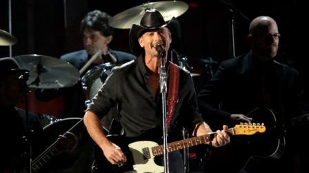 Tim McGraw performs his new song, One of Those Nights, at the 46th Annual Country Music Awards at the Bridgestone Arena on Thursday, Nov. 1, 2012, in Nashville, Tenn. (Photo by Wayde Payne/Invision/AP)

