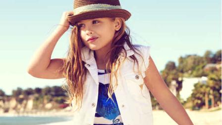 This campaign ad image provided by Guess? Inc., shows 6-year-old Dannielynn Birkhead. Birkhead, the daughter of the late Anna Nicole Smith, is walking in her mothers shoes, taking a starring role in the spring ad campaign for Guess Kids. (AP Photo/Guess? Inc.)