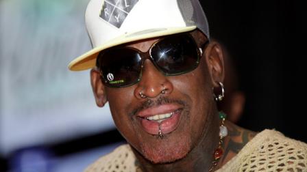 Former NBA player Dennis Rodman gives a news conference to announce his tour and charity work in Panama City, Tuesday, July, 31, 2012. (AP Photo/Arnulfo Franco)