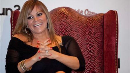 Singer Jenni Rivera, reacts during a ceremony presenting her with a star for the Las Vegas Walk of Stars, Friday, July 1, 2011, in Las Vegas. The actual star will be embedded in the sidewalk in front of the MGM Grand Casino along Las Vegas Boulevard on Saturday. (AP Photo/Julie Jacobson)