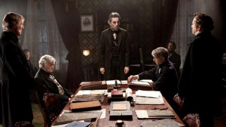 FILE - This undated publicity photo released by DreamWorks and Twentieth Century Fox shows, Daniel Day-Lewis, center rear, as Abraham Lincoln, in a scene from the film, Lincoln. Disney is making more prints of director Steven Spielbergs historical saga to meet theater owners unexpected demand. The DreamWorks film earned $25 million at the box office last weekend, lifting its domestic revenue to $62.2 million.