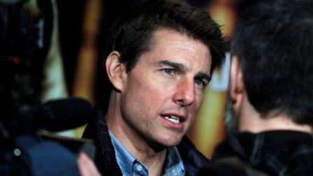 US actor Tom Cruise speaks to the press during a Jack Reacher film presentation at the Callao Movie Theater, in Madrid, Spain, Thursday, Dec. 13, 2012.(AP Photo/Andres Kudacki)