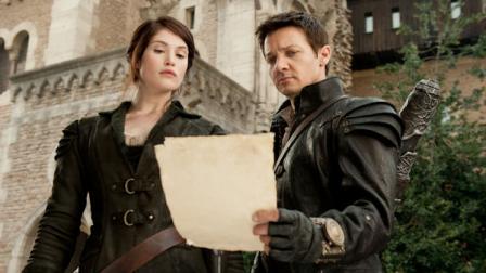 This film image released by Paramount Pictures shows Gemma Arterton as Gretel, left, and Jeremy Renner as Hansel in a scene from Hansel and Gretel: Witch Hunters. (AP Photo/Paramount Pictures, David Appleby)