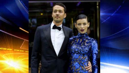 FILE - In this May 14, 2012 file photo, actress Liberty Ross with director Rupert Sanders pose for the media at the World Premiere of the film, Snow White and the Huntsman, at a cinema in central London. Ross filed for divorce on Friday, Jan. 28, 2013 in Los Angeles, roughly five months after it was revealed that Sanders had engaged in a brief affair with actress Kristen Stewart. (AP Photo/Alastair Grant, File)