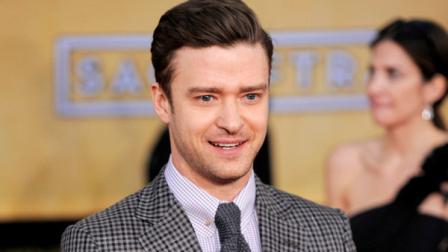 FILE - This Jan. 27, 2013 file photo shows actor-singer Justin Timberlake at the 19th Annual Screen Actors Guild Awards at the Shrine Auditorium in Los Angeles. The Recording Academy announced Wednesday, Jan. 30, that the pop star will perform at the awards show on Feb. 10. (Photo by Chris Pizzello/Invision/AP)