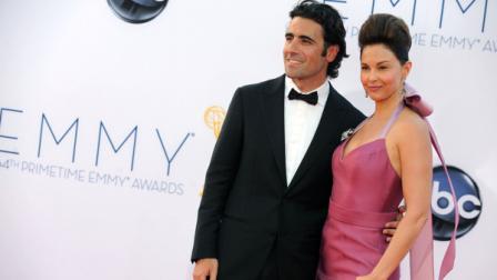 FILE - In this Sept. 23, 2012 file photo, actress Ashley Judd, right, and her husband, Dario Franchitti, arrives at the 64th Primetime Emmy Awards at the Nokia Theatre, in Los Angeles. Judds spokeswoman confirmed a Tuesday, Jan. 29, 2013, report from People that the 44-year-old actress and 39-year-old Scottish race car driver are ending their marriage. (Photo by Matt Sayles/Invision/AP, File)
