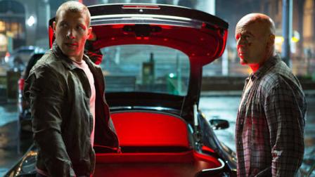 This film image released by 20th Century Fox shows Bruce Willis as John McClane, right, and Jai Courtney as his son Jack in a scene from A Good Day to Die Hard. (AP Photo/20th Century Fox, Frank Masi)