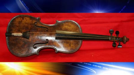In this undated photo provided by Henry Aldridge on Friday, March 15, 2013 shows the violin that was played by the bandmaster of the Titanic as the oceanliner sank, Devizes, England. Survivors of the Titanic have said they remember the band, led by Wallace Hartley, playing on deck even as passengers boarded lifeboats after the ship hit an iceberg. Hartleys violin was believed lost in the 1912 disaster, but auctioneers Henry Aldridge and Son say an instrument unearthed in 2006 has undergone rigorous testing and proven to be Hartleys. The auction house said has spent the past seven years and thousands of pounds determining the water-stained violins origins, consulting numerous experts including government forensic scientists and Oxford University. (AP Photo/Henry Aldridge)