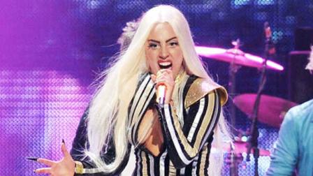 FILE - This Dec. 15, 2012 file photo shows singer Lady Gaga performing at the Prudential Center in Newark, N.J. Lady Gagas manager said in an interview Tuesday, March 19, 2013, that the singer is doing wonderful, doing great, after undergoing hip surgery. Gaga canceled her Born This Way Ball tour last month after shed hurt herself while performing some time ago. (Photo by Evan Agostini/Invision/AP, file)