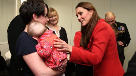 Kate, the Duchess of Cambridge talks to members of the crew and their families as she visits the Astute-class Submarine Building at BAE Systems in Barrow-in-Furness, England, Friday April 5, 2013. (AP Photo/Chris Jackson, Pool)