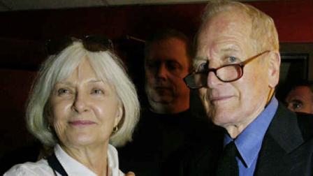 ** FILE ** Joanne Woodward, left, and Paul Newman pose for a photograph at a party in memory of Tony Randall at Sardis in New York Oct. 5, 2004. Newman and Woodward will celebrate their golden wedding on Tuesday, Jan. 29, 2008. (AP Photo/Tina Fineberg)