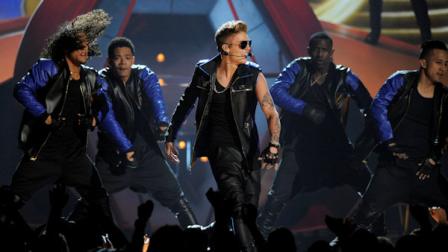 Justin Bieber, center, performs at the Billboard Music Awards at the MGM Grand Garden Arena on Sunday, May 19, 2013 in Las Vegas. (Photo by Chris Pizzello/Invision/AP)