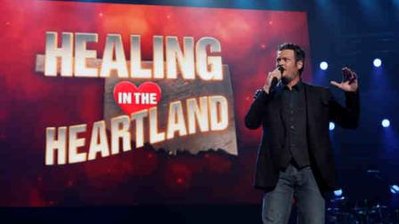 This image released by NBC Universal shows country singer Blake Shelton during the Healing in the Heartland: Relief Benefit Concert at the Chesapeake Energy Arena in Oklahoma City, Okla., Wednesday, May 29,2013. Funds raised by the benefit will go to the United Way of Central Oklahoma, for recovery efforts for those affected by the May 20 tornado. (AP Photo/NBC, Trae Patton)