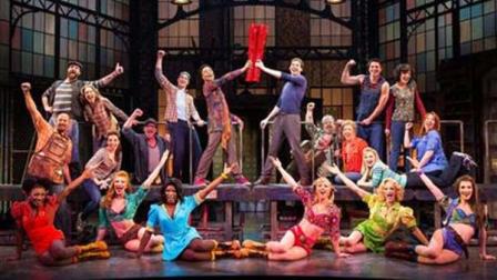 This theater image released by The O+M Company shows the cast during a performance of the musical Kinky Boots. The Cyndi Lauper-scored Kinky Boots, based on the 2005 British movie about a real-life shoe factory that struggles until it finds new life in fetish footwear, is nominated for 13 Tony Award nominations. The awards will be broadcast on CBS from Radio City Music Hall on June 9. (AP Photo/The O+M Company, Matthew Murphy)
