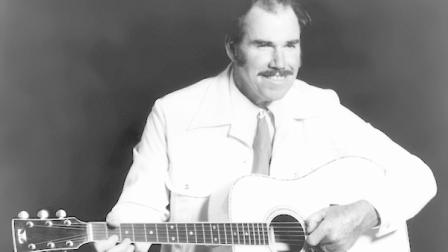 FILE - This undated file photo shows country singer Slim Whitman. Whitman died Wednesday, June 12, 2013 of heart failure in Florida. He was 90. Whitmans career began in the late 1940s, and his tenor falsetto and ebony mustache and sideburns became global trademarks. They were also an inspiration for countless jokes thanks to the ubiquitous 1980s and 1990s TV commercials that pitched his records. (AP Photo, file)