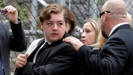 Michael Gandolfini, left, son of James Gandolfini, arrives for the funeral service of his father, star of The Sopranos, in New Yorks the Cathedral Church of Saint John the Divine, Thursday, June 27, 2013. The 51-year-old actor died of a heart attack last week while vacationing in Italy with his son.