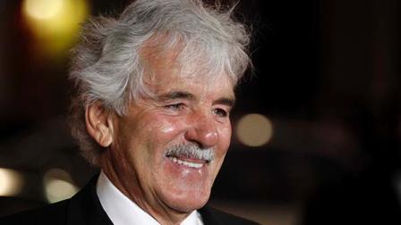 FILE - In this Jan. 25, 2012 file photo, Dennis Farina arrives at the premiere for the HBO television series Luck in Los Angeles. Farina died suddenly on Monday, July 22, 2013, in Scottsdale, AZriz., after suffering a blood clot in his lung. He was 69. (AP Photo/Matt Sayles, File)