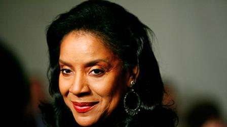FILE - In this Oct. 26, 2009 file photo, actress Phylicia Rashad enters the Kennedy Center to attend the Mark Twain Prize for American Humor, honoring Bill Cosby, in Washington. (AP Photo/Jacquelyn Martin, file)