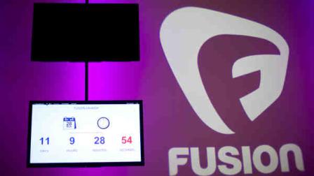 This Thursday, Oct. 18 2013 photo shows the count-down clock until the launch of the Fusion network at its Miami studio. The long-awaited, sorta Hispanic love child of ABC and Univision networks will be birthed Oct. 28. (AP Photo/J Pat Carter)