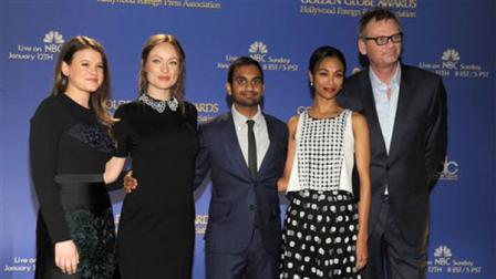 From left, Miss Golden Globe 2014 Sosie Bacon, Olivia Wilde, Aziz Ansari, Zoe Saldana and Hollywood Foreign Press Association President Theo Kingma pose on stage after the nominations for the 71st Annual Golden Globe Awards on Thursday, Dec. 12, 2013 in Beverly Hills, Calif. The 71st Annual Golden Globe Awards will be held on Sunday, Jan. 12, 2014. (Photo by Chris Pizzello/Invision/AP)