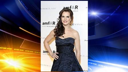 FILE - In this Feb. 10, 2010 file photo originally released by MAC Cosmetics, actress Brooke Shields attends the amfAR New York Gala in New York. Shields, a 1987 graduate of Princeton University, is giving the universitys important and often whimsical Class Day celebration as part of graduation weekend. (AP Photo/MAC Cosmetics, David Goldman)