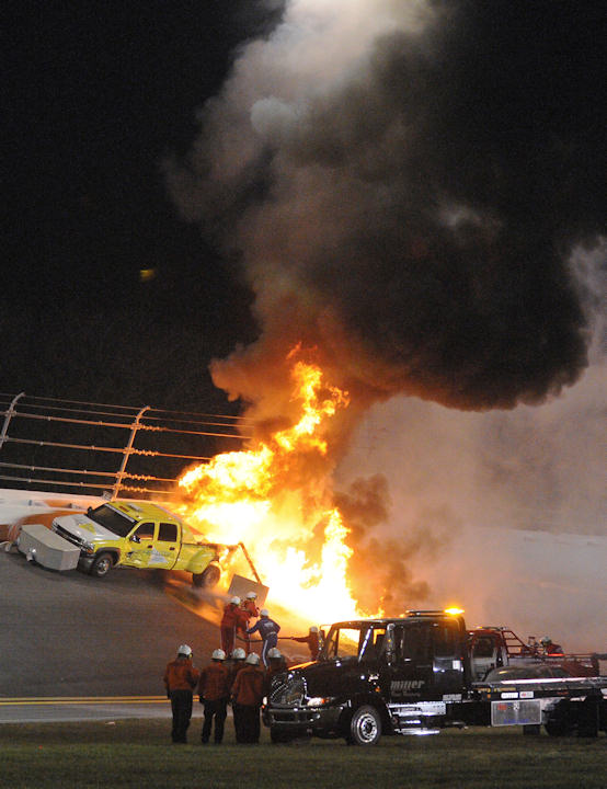 Emergency workers put out a fire on a jet dryer...