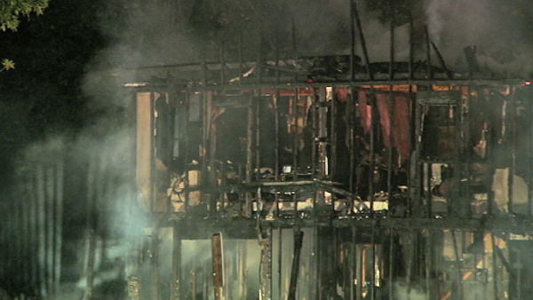  on the scene after a car slammed into a house and burst into flames ...