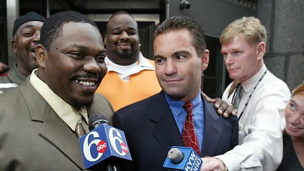 Rapper Beanie Sigel, left, exits court in Philadelphia, Monday, Sept. 26, 2005, with attorney Fortunato Perri Jr., right, by his side. Sigel was found not guilty Monday on charges he shot and nearly killed a man two years ago on a crowded city street. (AP Photo/Joseph Kaczmarek)