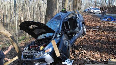 Car hits tree in Hockessin, Delaware injuring two on November 22, 2009