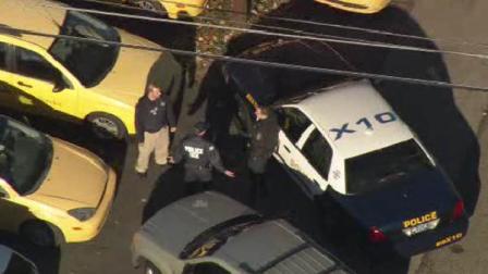 Chopper 6 over the scene of the raid at The Maids Home Services in Levittown, Pa.