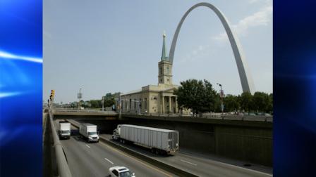 FILE - In this Aug. 29, 2007 file photo, the depressed section of Interstate 70 passes in front of the Gateway Arch and the grounds of the Jefferson National Expansion Memorial in St. Louis. A national study released Sunday, Nov. 21, 2010 finds St. Louis overtook Camden, N.J., as the nations most dangerous city in 2009. (AP Photo/Tom Gannam, File)