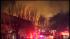 RAW VIDEO: Smoke fills Tacony sky :: A gas main explosion led to a multi-alarm fire in the Tacony section of Philadelphia on Tuesday, January 18, 2011.