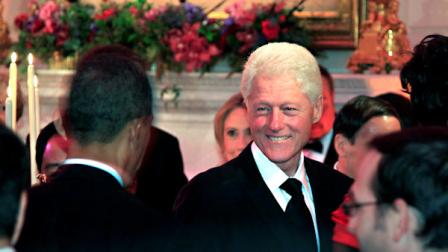 Former President Bill Clinton, right, greets President Barack Obama as Obama arrives at a State Dinner in honor of Chinas President Hu Jintao, Wednesday, Jan. 19, 2011, at the White House in Washington. (AP Photo/Carolyn Kaster)