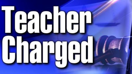 Teacher Charged