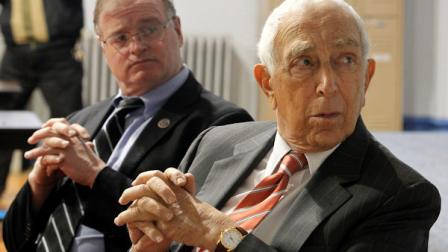 U.S. Sen. Frank Lautenberg (D-NJ), right, and Jersey City Mayor Jerramiah Healy listen as Ahmed Shedeed, director of the Islamic Center of Jersey City, talks during a gathering at the center, Sunday, Feb. 13, 2011. (AP Photo/Julio Cortez)