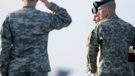 An Army carry team moves a transfer case containing the remains of Sgt. 1st Class Daehan Park Monday, March 14, 2011 at Dover Air Force Base, Del. According to the Department of Defense, Park, 36, of Watertown, Conn., died March 12, 2011 in Wardak province, Afghanistan of injuries sustained when enemy forces attacked his unit with an improvised explosive device. (AP Photo/Steve Ruark)