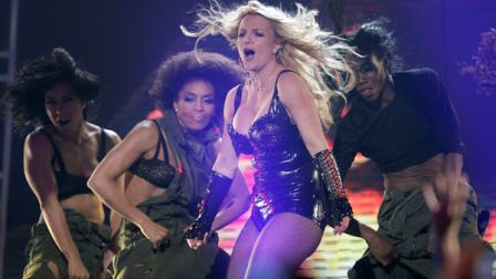 FILE - In this March 27, 2011 photo, Singer Britney Spears performs on ABCs Good Morning America show at the Bill Graham Civic Auditorium in San Francisco. A brand marketing company has sued Britney Spears for more than $10 million claiming they were cut out of a deal for the singers fragrance line. Brand Sense Partners LLC sued the pop singer and her father in Los Angeles on Wednesday, claiming the pair renegotiated a royalties deal with cosmetics company Elizabeth Arden last year. The lawsuit claims the new deal cut Brand Sense out of its 35 percent commission on Spears fragrance line. The fragrance deal was first made in 2004. (AP Photo/Tony Avelar)
