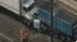 Car crushed between trucks in Camden County