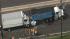 Car crushed between trucks in Camden County
