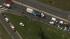 Car crushed between trucks in Camden County
