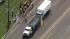Car crushed between trucks in Camden County