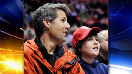 David Goldman, left, and his son Sean watch the New Jersey Nets play the Indiana Pacers in an NBA basketball game Friday night, Jan. 15, 2010 in East Rutherford, N.J. Goldman was reunited with his son last month after a bitter five-year battle in Brazil to regain custody.