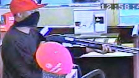 The FBI and Philadelphia police are searching for the suspects in an armed robbery of the Sovereign Bank branch on the 8600 block of Germantown Avenue.