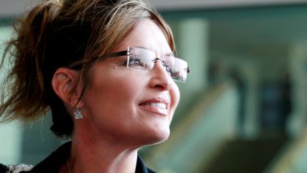 Former Alaska Gov. Sarah Palin exits the Hyatt Regency Hotel, Wednesday, June 1, 2011 in Jersey City, N.J. (AP Photo/Julio Cortez)
